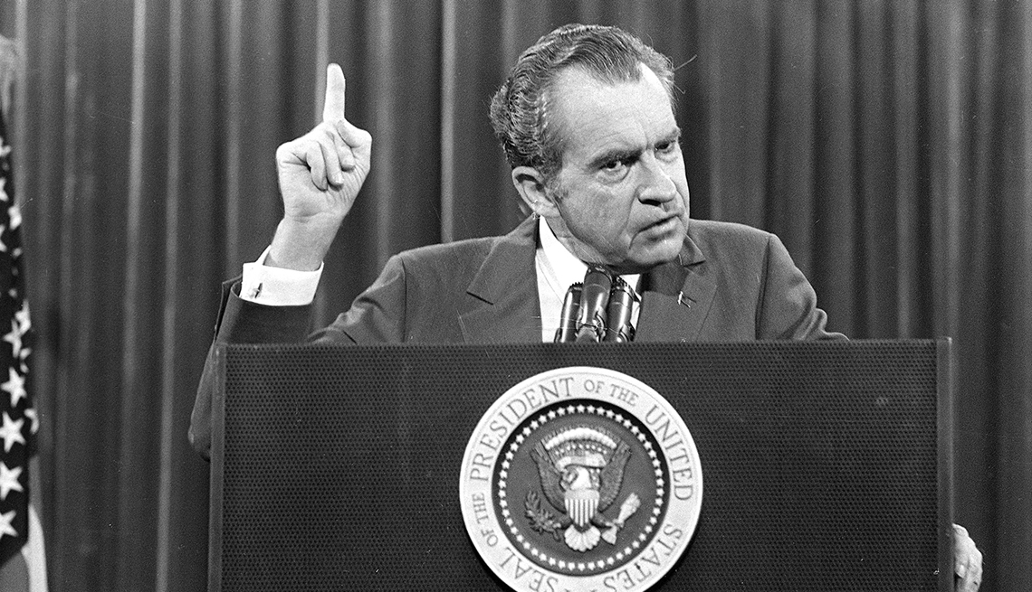 item 14 of Gallery image - president nixon at podium pointing upward with right hand