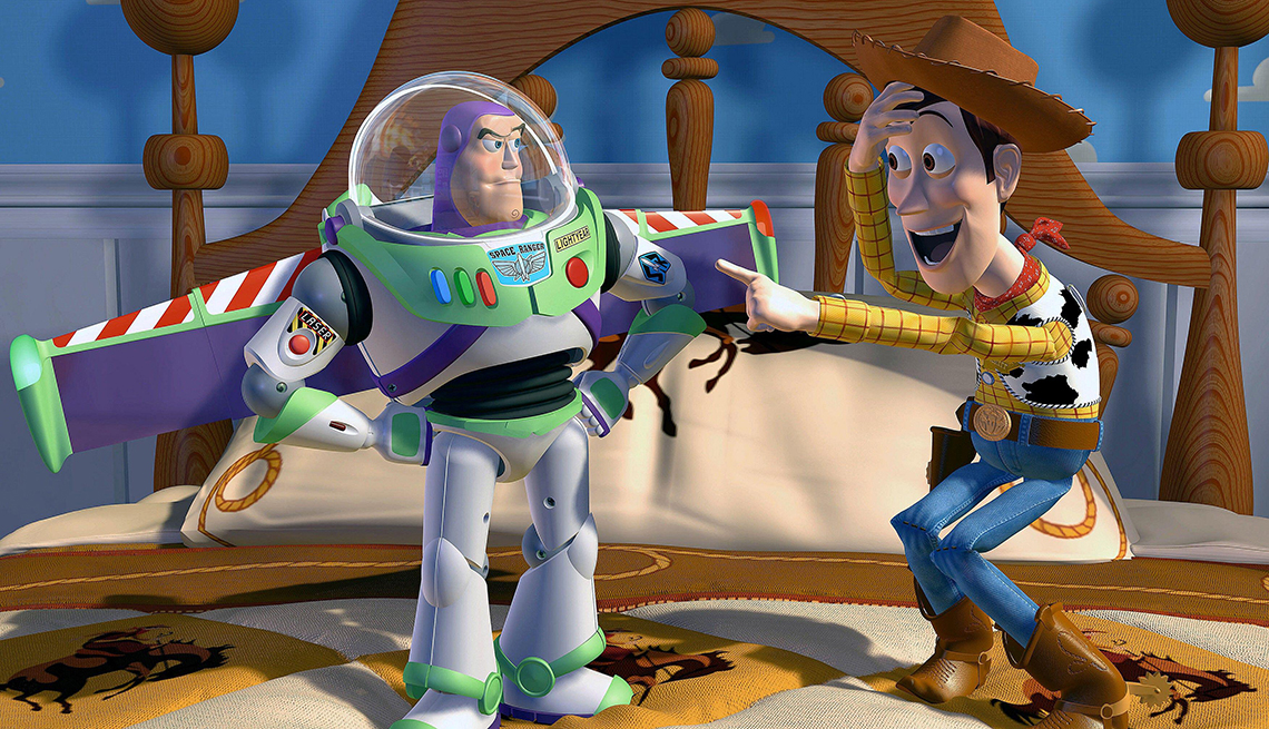 item 9 of Gallery image - buzz lightyear and woody from toy story standing on bed; woody pointing at buzz
