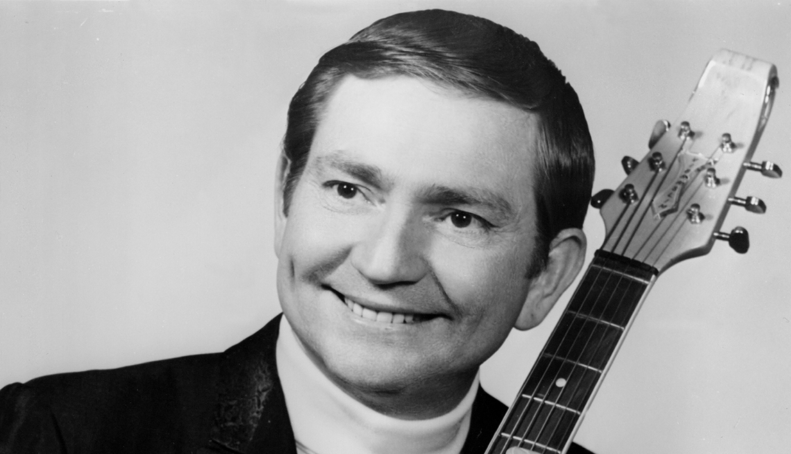 item 3 of Gallery image - black and white image of willie nelson posing with an electric guitar