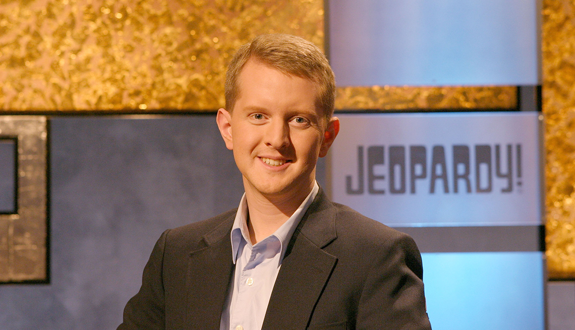 item 1 of Gallery image - ken jennings smiling with jeopardy sign over left shoulder
