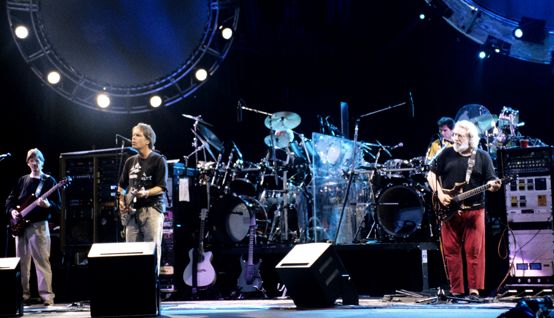 item 24 of Gallery image - phil lesh, bob weir, and jerry garcia of the grateful dead performing on stage