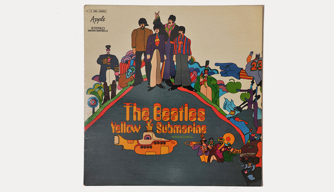 cover of yellow submarine with illustration of the beatles