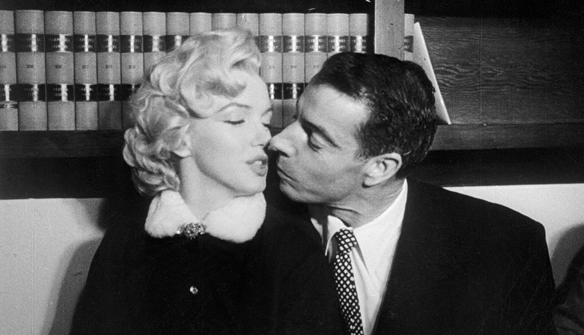 item 18 of Gallery image - marilyn monroe and joe dimaggio sitting down about to kiss