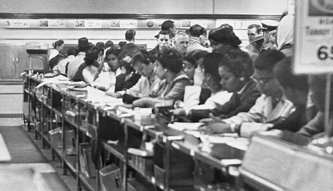 item 28 of Gallery image - Black students sitting at a whites only counter at a diner