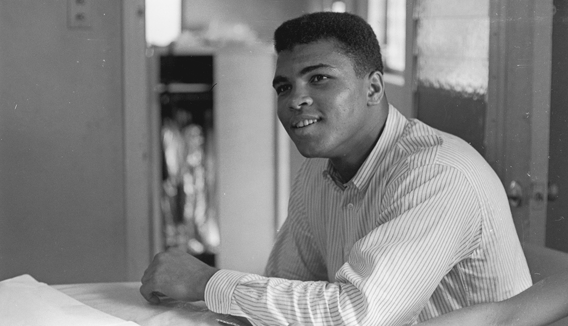item 14 of Gallery image - boxer cassius clay, later known as muhammad ali, sitting in chair subtly smiling