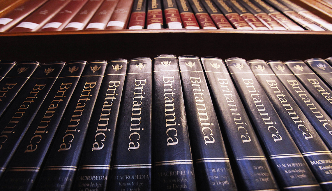 item 7 of Gallery image - encyclopedia britannica books lined up on shelf