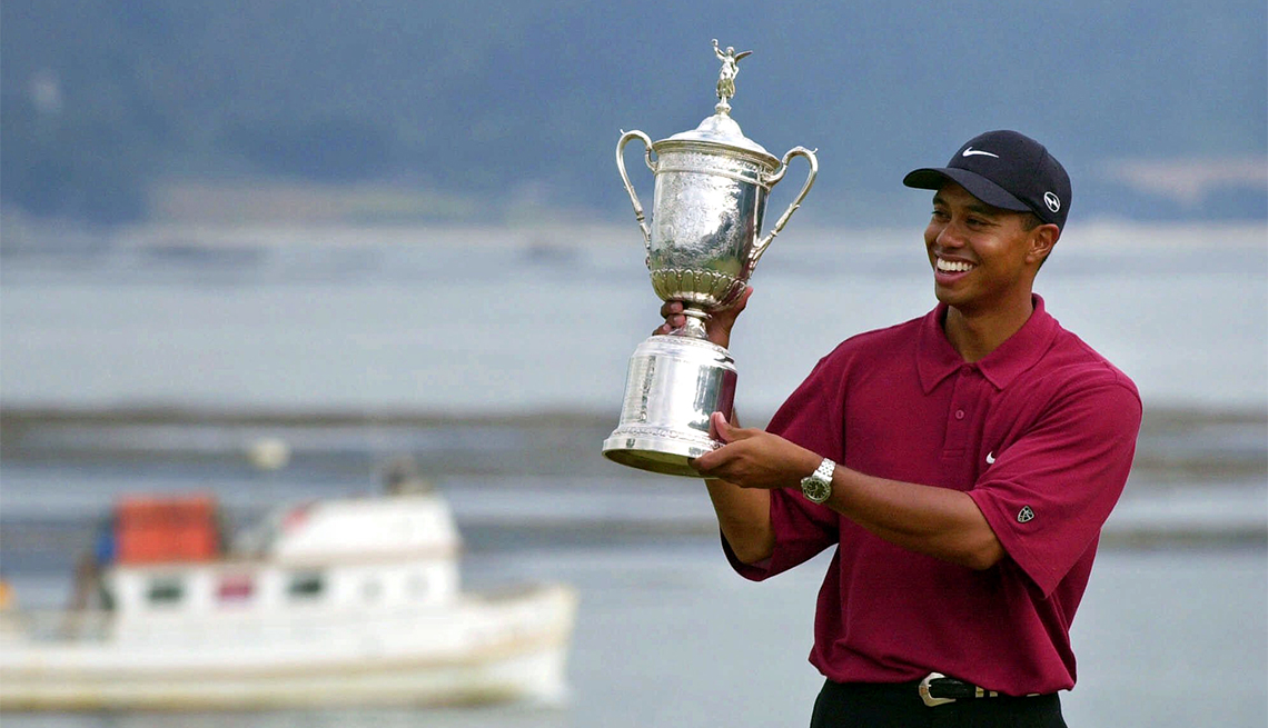 item 9 of Gallery image - Tiger Woods holding the trophy after capturing the 100th U.S. Open Golf Championship at the Pebble Beach Golf Links in Pebble Beach, California