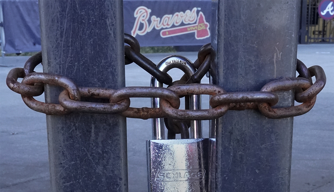 item 4 of Gallery image - Locked gates are shown at Truist Park, home of the Atlanta Braves baseball team