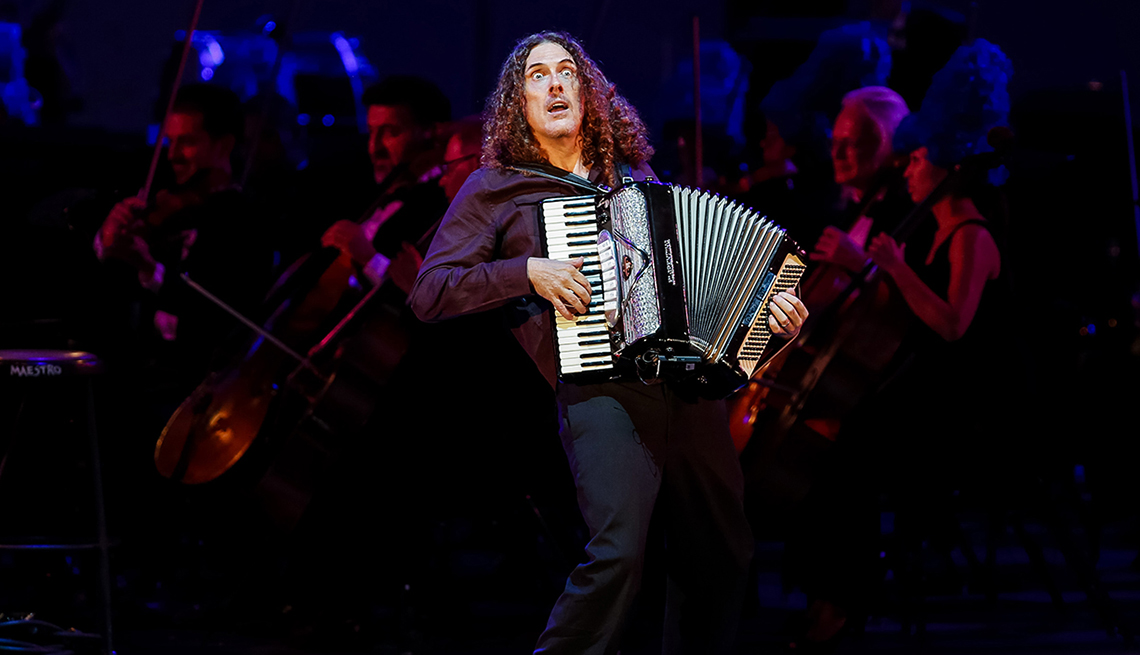 item 30 of Gallery image - "Weird" Al Yankovic performed, "Homer and Marge" and then played the Simpsons theme song on his accordion during "The Simpsons Take the Bowl," event, with the Hollywood Bowl Orchestra