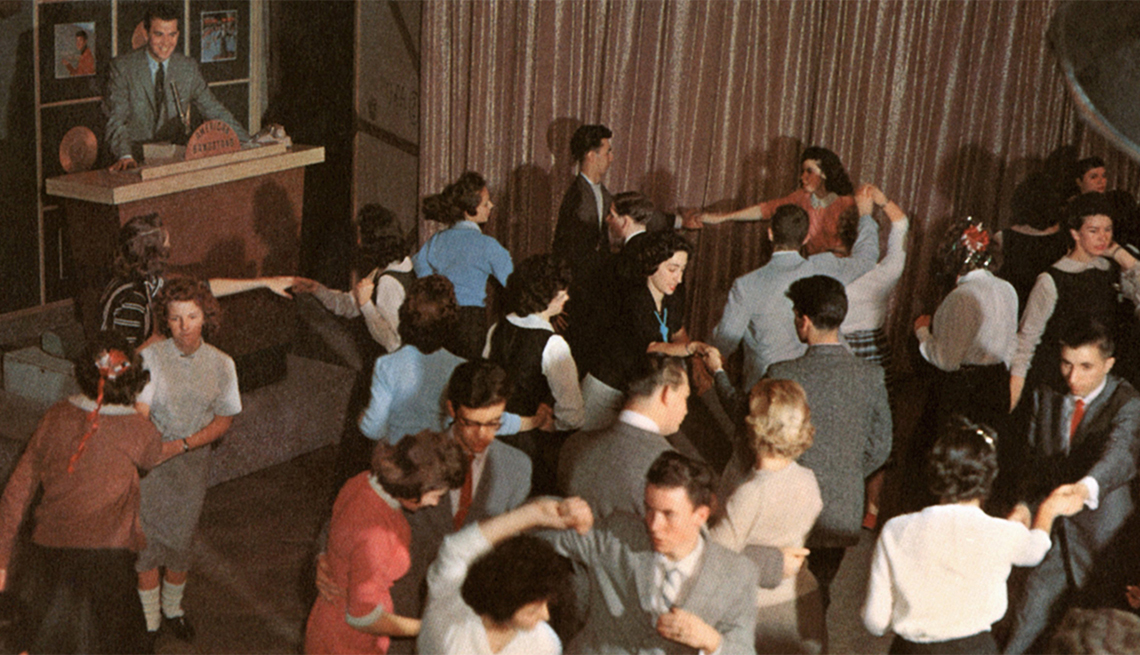 item 27 of Gallery image - Television host Dick Clark presides over the set of his show 'American Bandstand' as teenagers dance to top 40 popular music