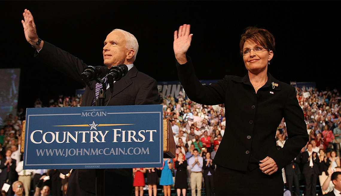 item 3 of Gallery image - Presumptive Republican presidential nominee John McCain stands with Alaska Gov. Sarah Palin onstage at a campaign rally in Dayton, Ohio.