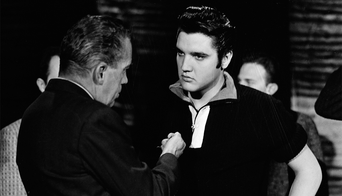 item 20 of Gallery image - American television personality Ed Sullivan (left) talks with singer and musician Elvis Presley (right) backstage at "The Ed Sullivan Show" in Los Angeles, California