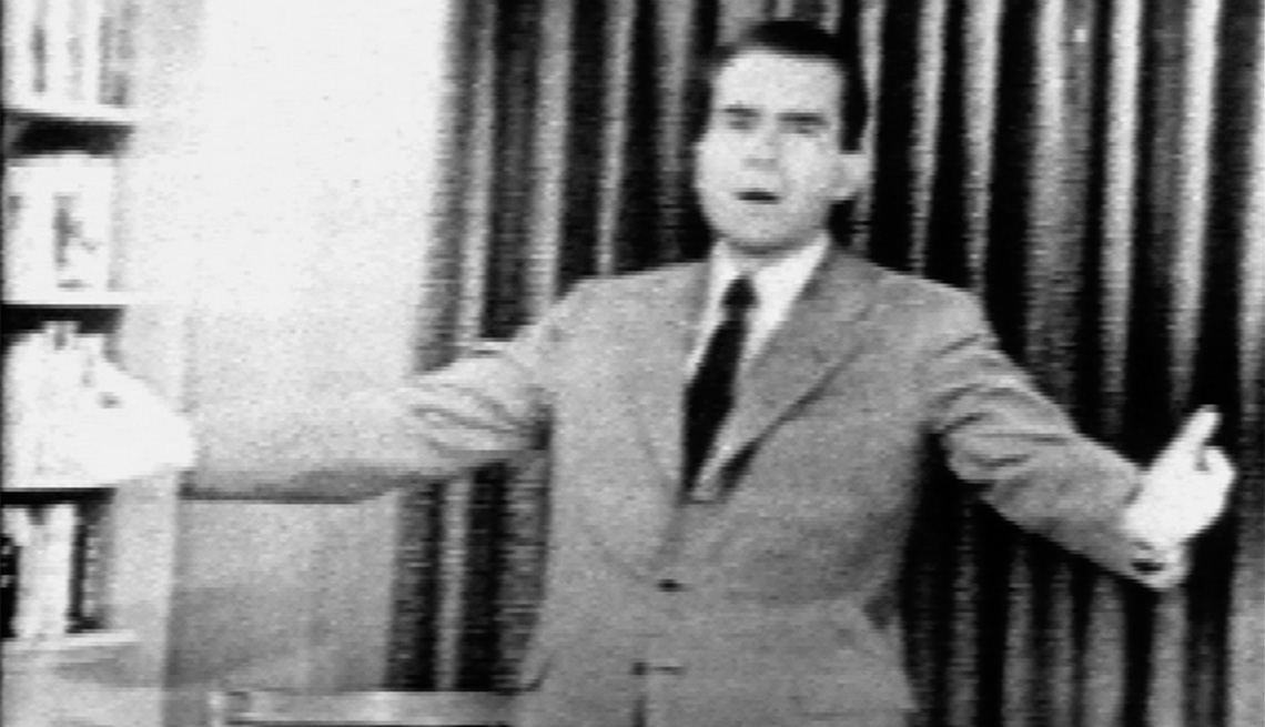 item 8 of Gallery image - Screen-capture shows politician Richard Nixon as he gestures expansively during his "Checkers" speech