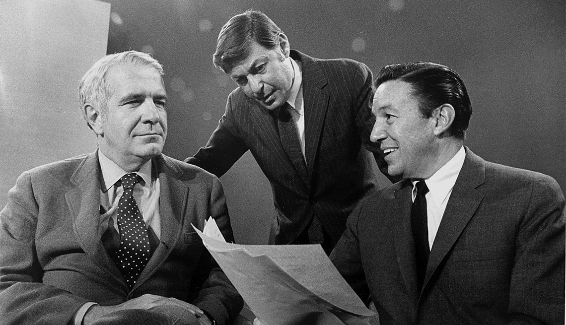 item 5 of Gallery image - 60 Minutes premieres with Harry Reasoner, left, and Mike Wallace, right. Don Hewitt, center, the show's creator and producer, confers with the two correspondents.
