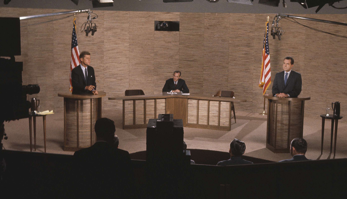item 3 of Gallery image - Newsman Howard K. Smith, center, acts as moderator during the debate between Sen. John F. Kennedy (D-Mass.) and Vice President Richard M. Nixon, in Washington, D.C.