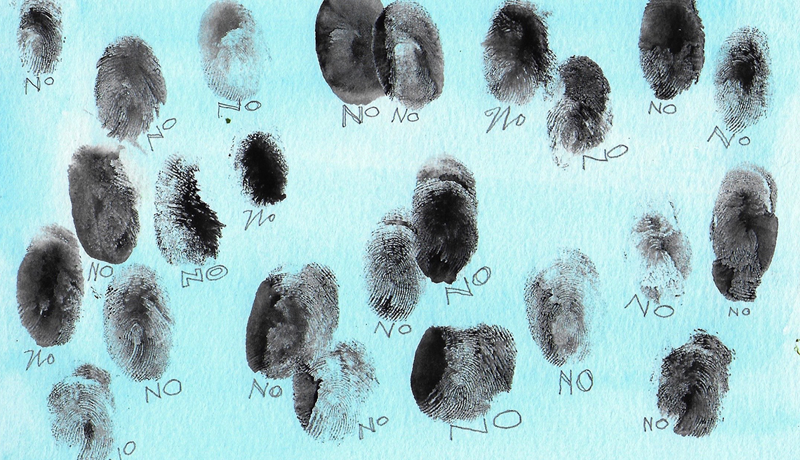 many black fingerprints on a blue background