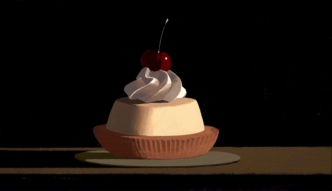 Illustration of fancy pastry with whipped cream and cherry on top