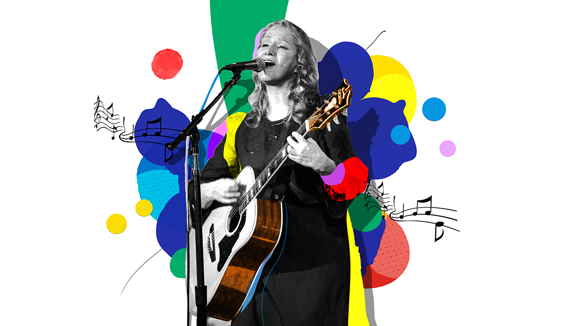 Colorful illustration of Joan Osborne at microphone playing guitar