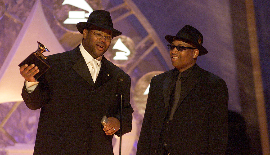 Jimmy Jam and Terry Lewis onstage accepting Grammy award