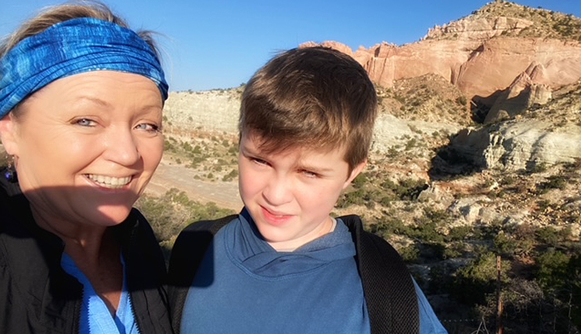 Terri Marshall and her grandson, Marshall pose while on vacation