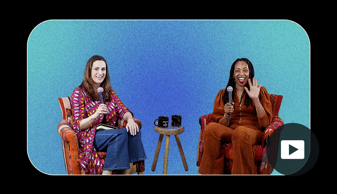 Daybreaker hosts Patty Morrissey and Pia Thompson sit in comfortable chairs with a small coffee table between them. Video play button on lower right corner.