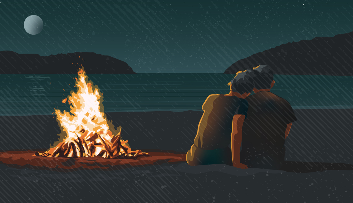 camp fire, moon, beach, ocean, couple snuggling 
