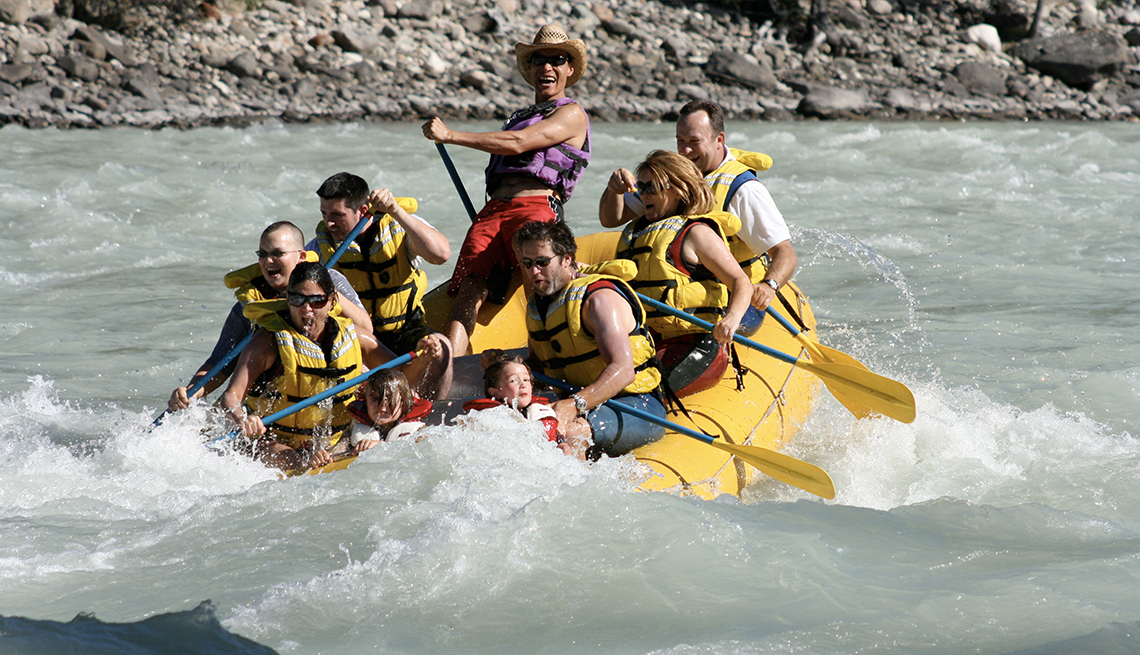A group of people enjoy rafting on the Athabasca River