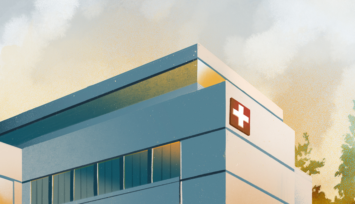illustration of exterior of hospital; white building with red and white cross on side