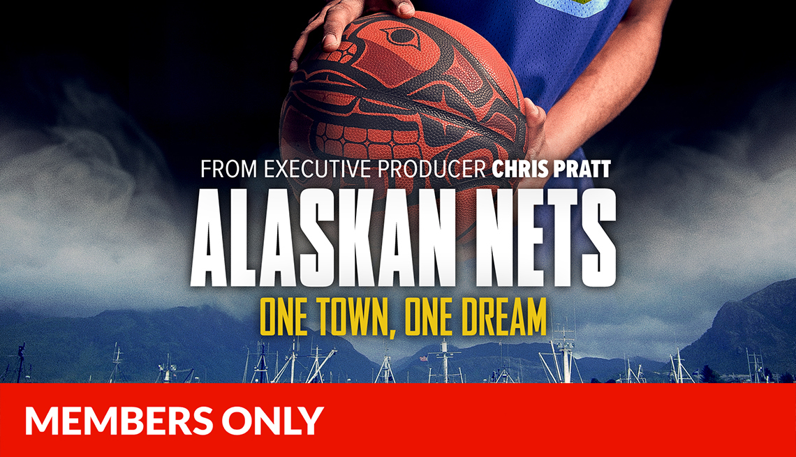 alaskan nets cover with boats on bottom, hands holding basketball on top and words in middle; red members only banner on bottom