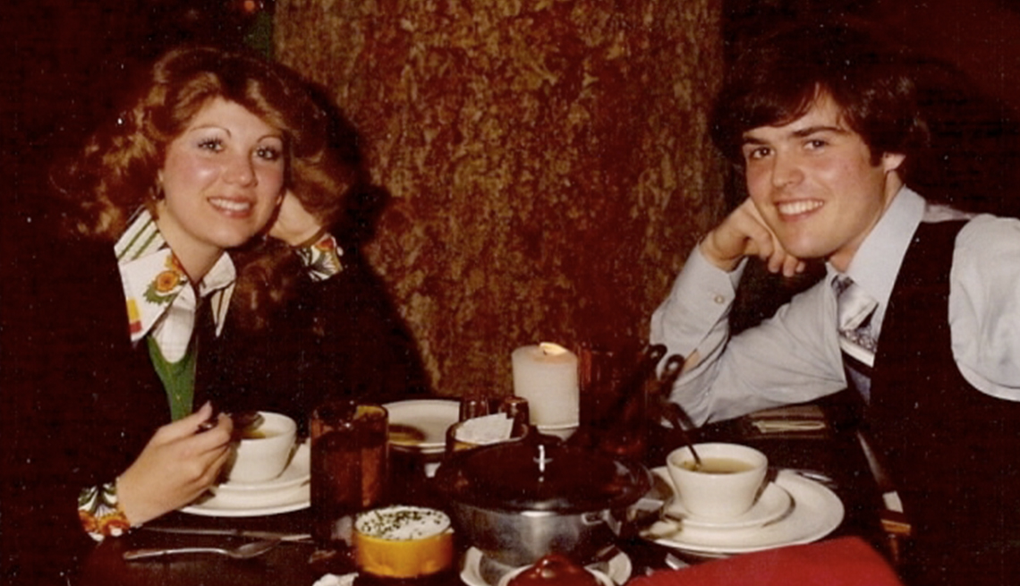 deborah and donny osmond at table with coffees in front of them