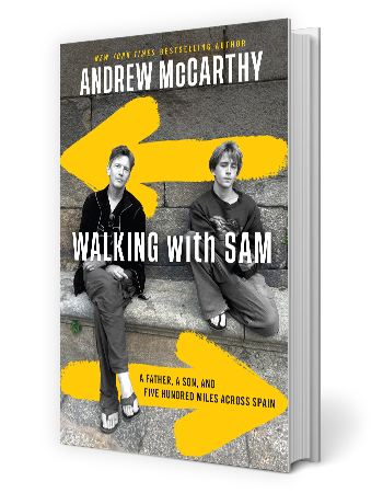 cover of andrew mccarthy book called walking with sam, showing photo of him and his son and two big painted arrows, one pointing left and the other pointing right