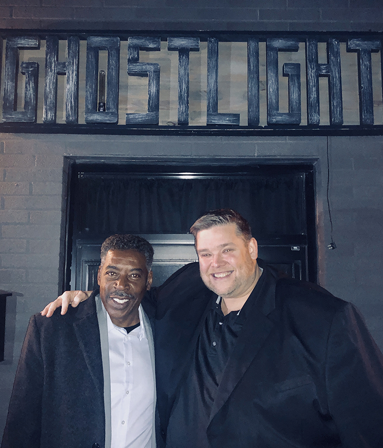 ernie hudson and paul mow in front of ghostlight sign at the ghostlight theatre 