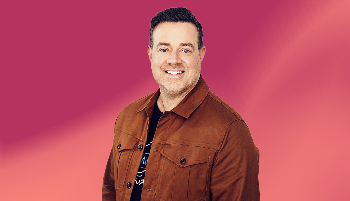 Carson Daly headshot against pink background