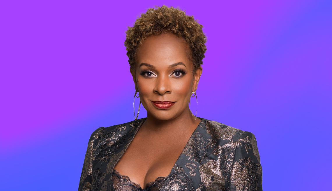 Vanessa Bell Calloway against purple and blue ombre background