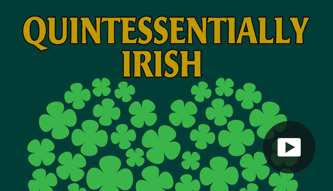 Words "Quintessentially Irish" above a bunch of four leaf clovers in the shape of a heart