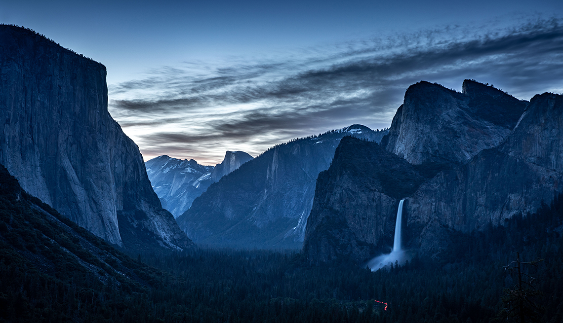 item 17 of Gallery image - view of yosemite's bridalveil fall and surrounding mountain peaks from a distance