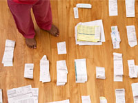 Piles of receipts-online financial management can help you with expense tracking and analyze spending