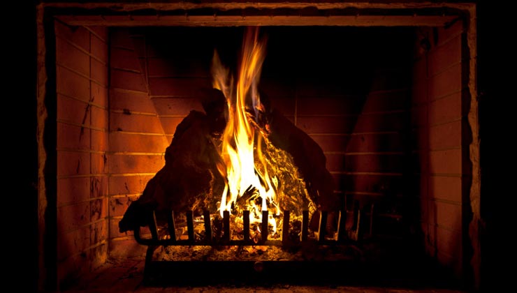 Roaring fire in fireplace