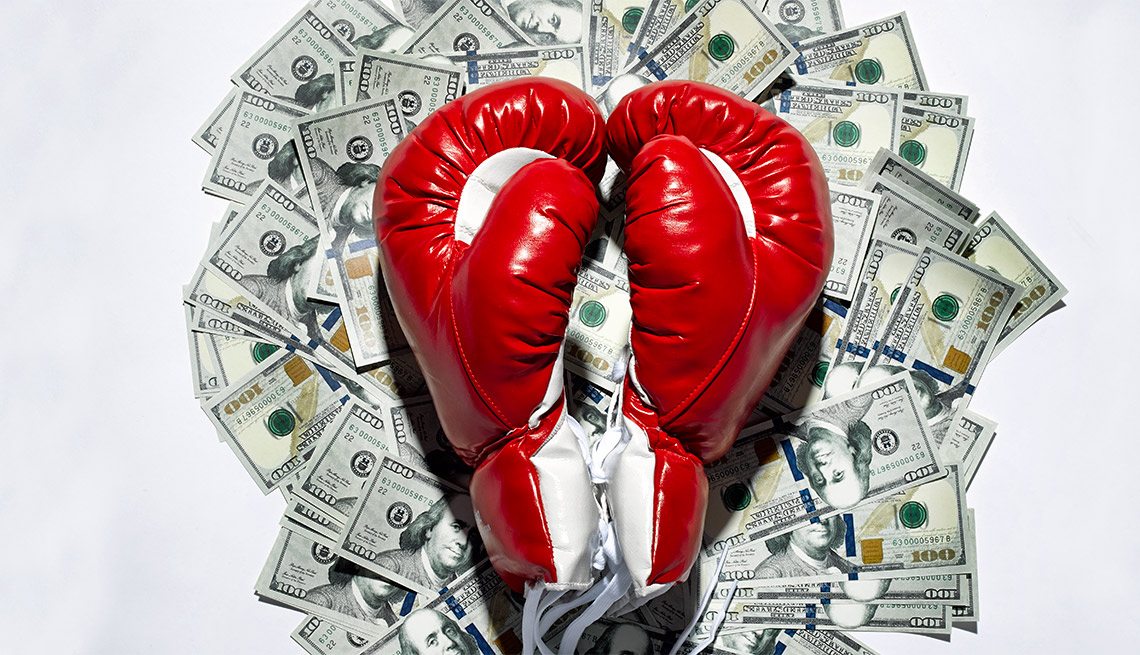 red boxing gloves and money - Love and Money Issues 