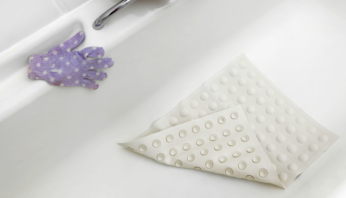 Non-slip bath mats are one way to create safer bathroom surfaces