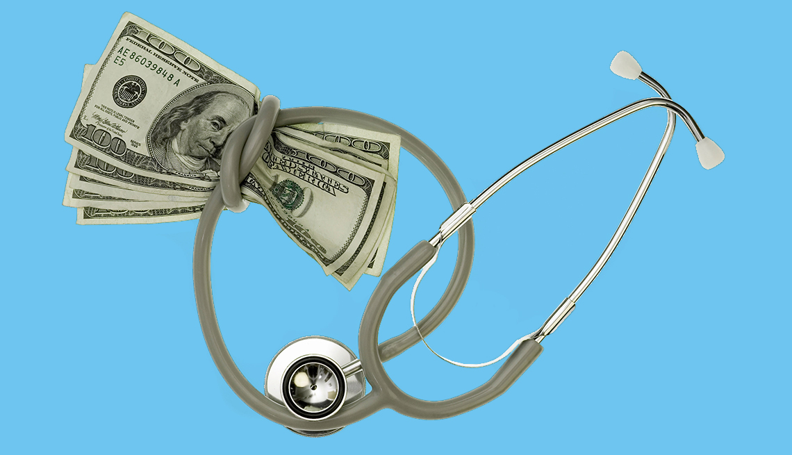 Hundred dollar bills strangled by a stethoscope
