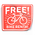 illustration of a red sticker with a bicycle and the words free bike rental on it