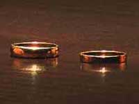 A second marriage may need a prenup to protect kids and savings- hands with wedding rings