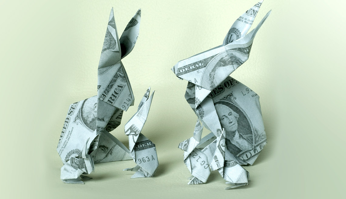 Figuras de conejos hechas con dólares - Inversiones en acciones DRIPs