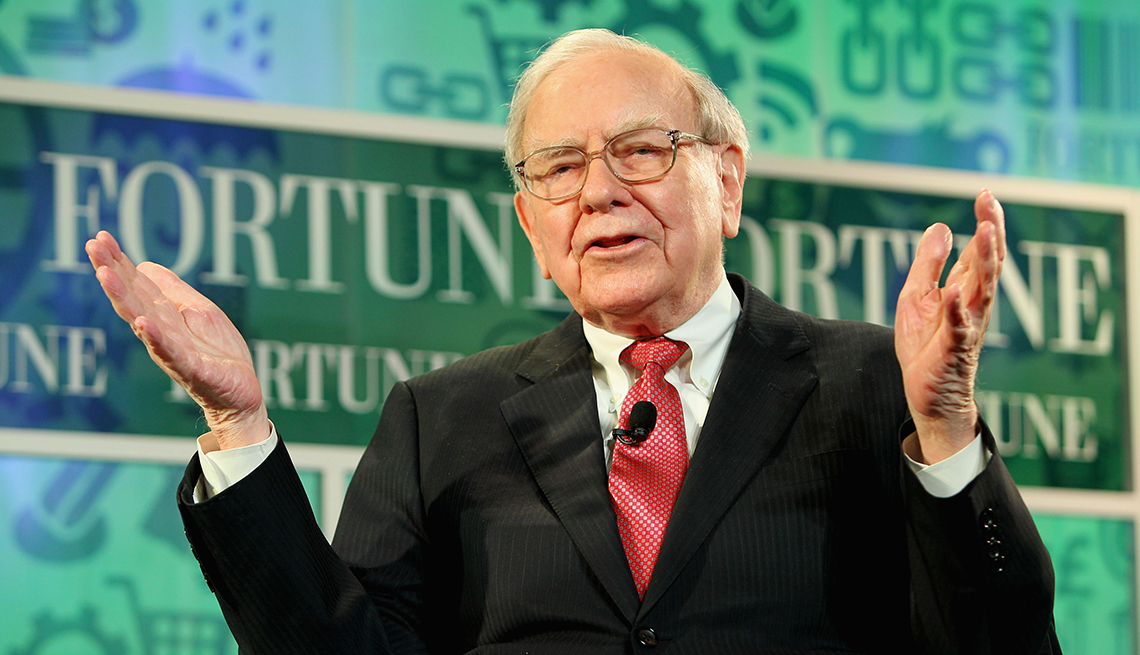 item 7 of Gallery image -  Warren Buffett gestures while he speaks onstage at a Fortune Magazine event
