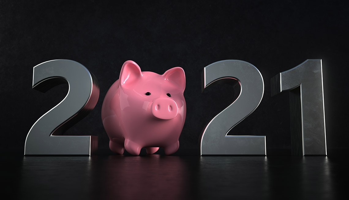A pink piggy bank replaces the zero in a display representing the new year 2021