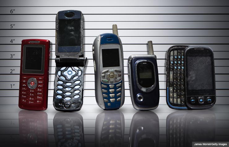 Line-up of old cell phones