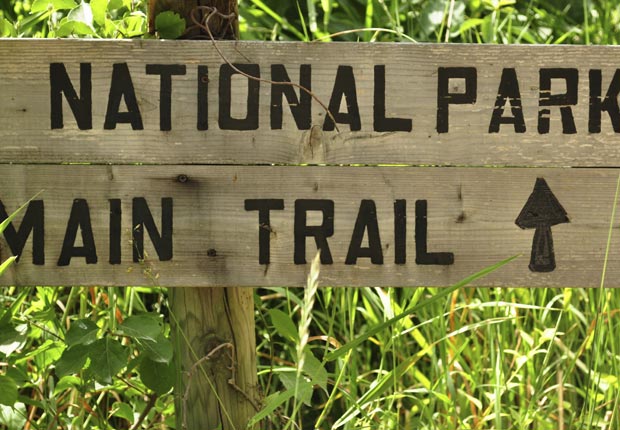 National Park sign in grass (Andrew DeCrocker/Istockphoto)