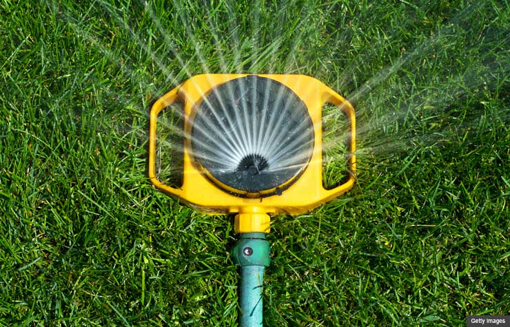 Use a sprinkler that sprays large drops close to the ground.