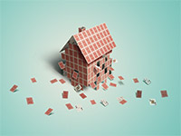 Real Estate Fraud is one of the top ten consumer complaints - Collapsing house made of cards 